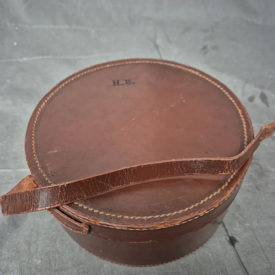 PERSONALISED CIRCULAR LEATHER STORAGE CASE 