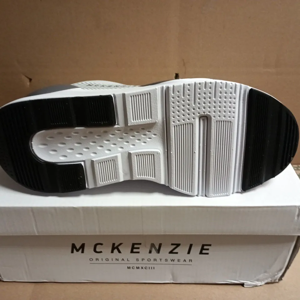 BOXED PAIR OF MCKENZIE WHITE SNEAKERS – UK SIZE 7