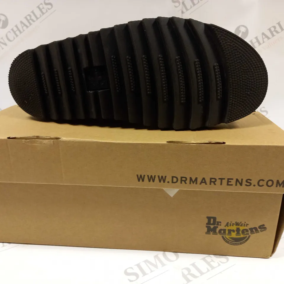 boxed pair of dr martens blaire hydro leather strap sandals 