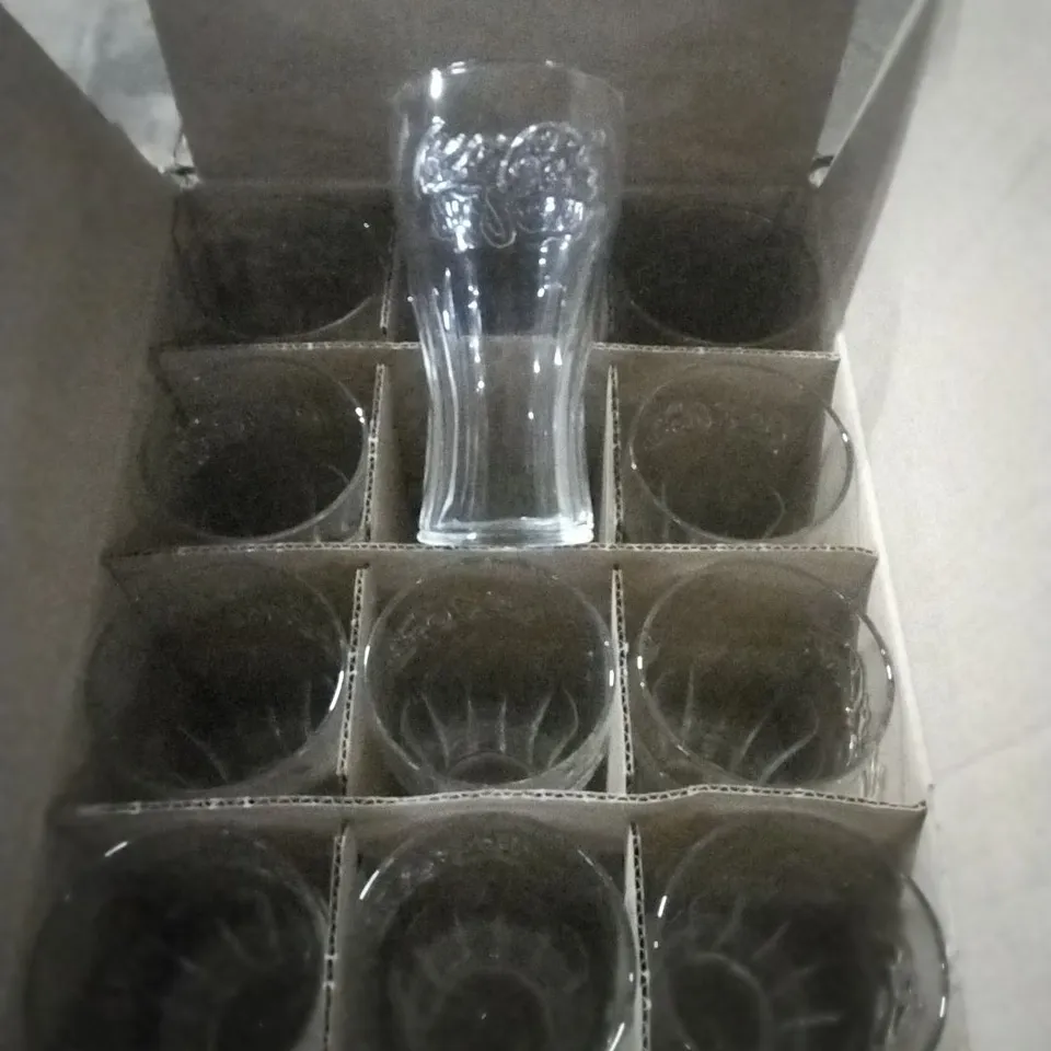 BOXED COCA COLA GENUINE CONTOUR GLASS 16 OZ APPROXIMATELY 20 PER PACK 