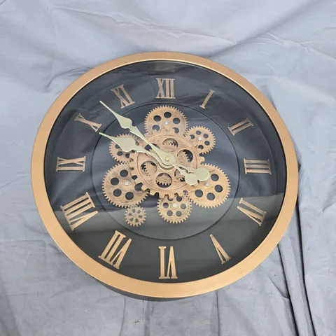 GOLD-TONE SKELETON WALL CLOCK WITH EXPOSED GEARS AND ROMAN NUMERALS (STEAMPUNK STYLE)