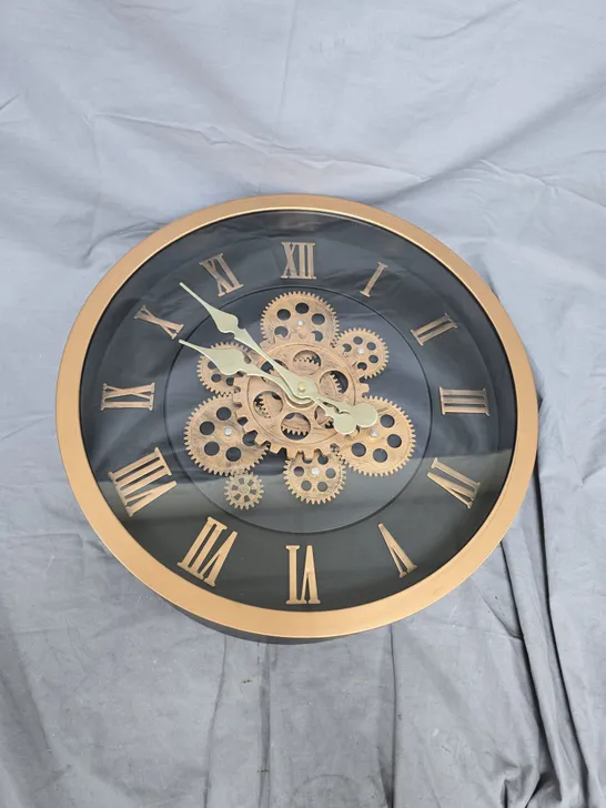 Lot 5554: GOLD-TONE SKELETON WALL CLOCK WITH EXPOSED GEARS AND ROMAN ...