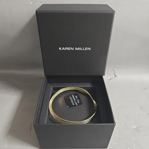 BOXED KAREN MILLEN 14KT GOLD PLATED TEXTURED TWIST NARROW BANGLE