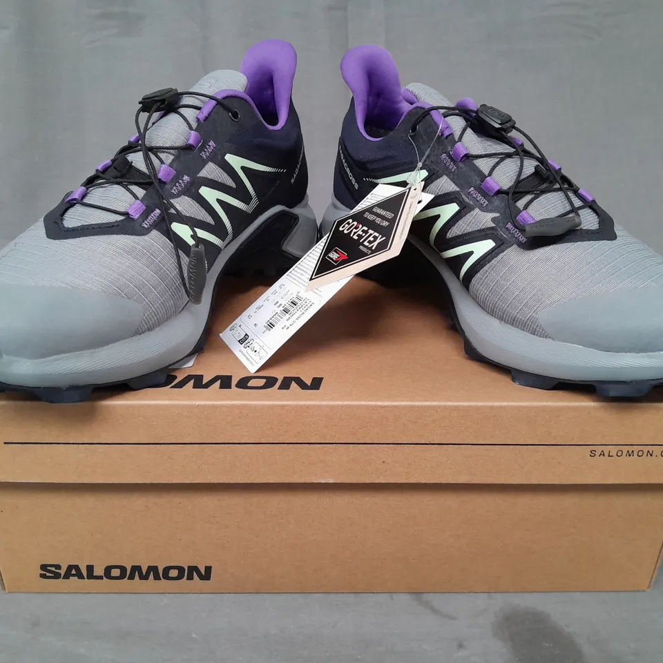 BOXED PAIR OF SALOMON SAGACROSS SHOES IN NAVY/PURPLE/SEA FOAM UK SIZE 6.5