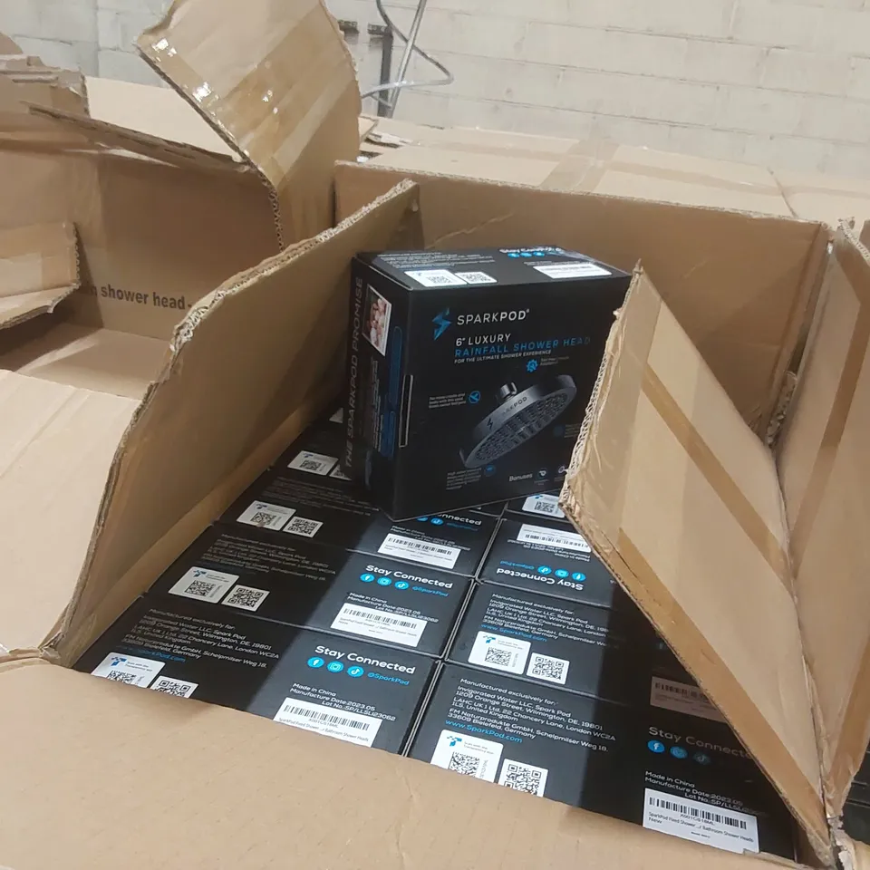 PALLET CONTAINING A LARGE QUANTITY OF SPARKPOD RAINFALL SHOWER HEADS ECT