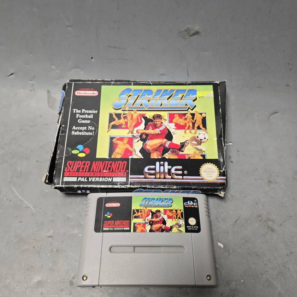 BOXED SUPER NINTENDO ENTERTAINMENT SYSTEM PAL VERSION STRIKER THE PREMIER FOOTBALL GAME 
