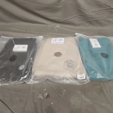 APPROXIMATELY 30 ASSORTED BAGGED CLOTHING ITEMS IN VARIOUS SIZES, STYLES & COLOURS TO INCLUDE MENS GET YOUR COLD ON JOGGERS, UNISEX GET YOUR COLD ON JOGGERS, LADIES BRASS MONKEY SHORTS, ETC