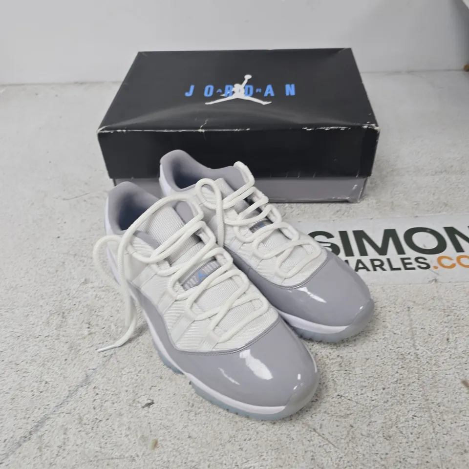 AIR JORDAN 11 RETRO LOW – WHITE/UNIVERSITY BLUE, UK 10 (US 11)