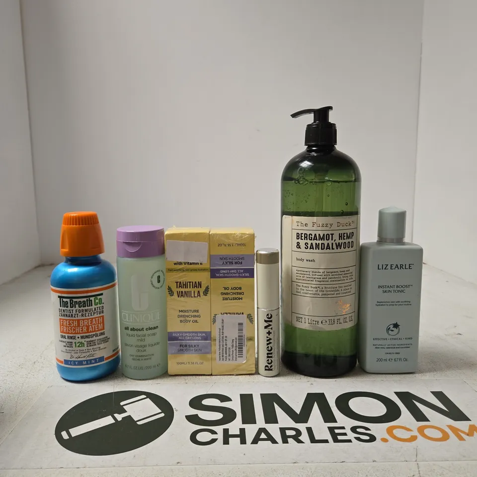TOTE OF APPROXIMATELY 10 ASSORTED BEAUTY PRODUCTS INCLUDING THE BREATH CO ORAL RINSE, CLINIQUE LIQUID FACIAL SOAP MILD AND TAHITIAN VANILLA BODY OIL