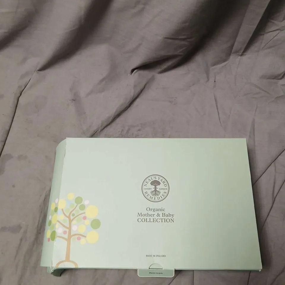 NEAL'S YARD REMEDIES ORGANIC MOTHER & BABY COLLECTION GIFT SET ONE BOTTLE MISSING