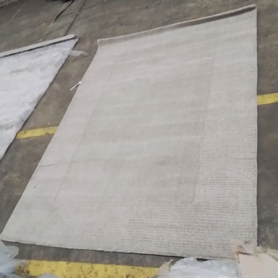 STILLAGE OF APPROXIMATELY 20 BAGGED QUALITY DESIGNER RUGS