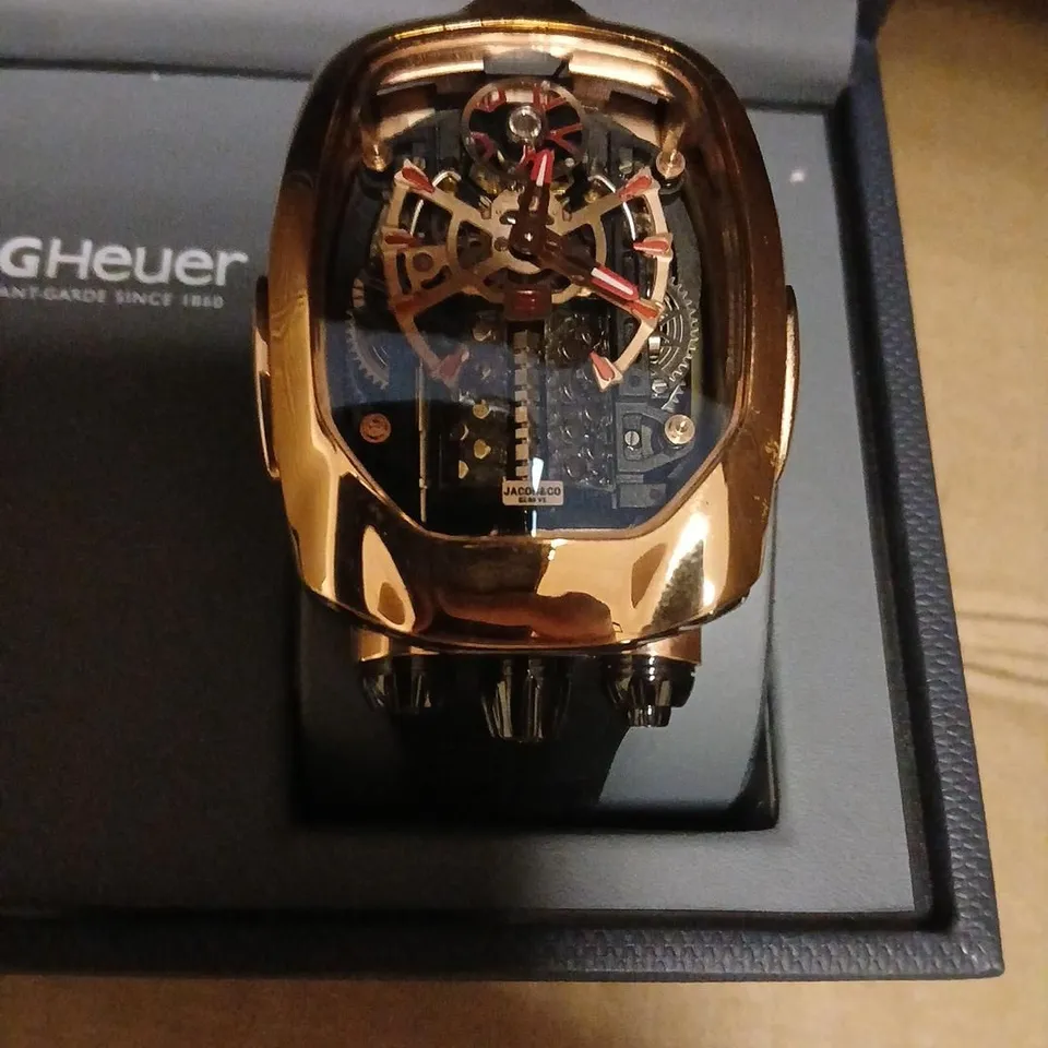 JACOB & CO SKELETON WATCH – ROSE GOLD TONE, SKELETON DIAL, BLACK STRAP