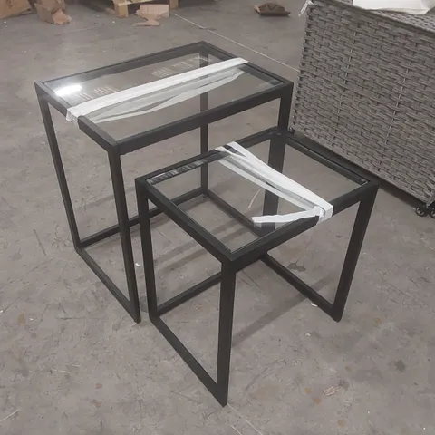 PAIR OF GLASS TOP NESTING TABLES