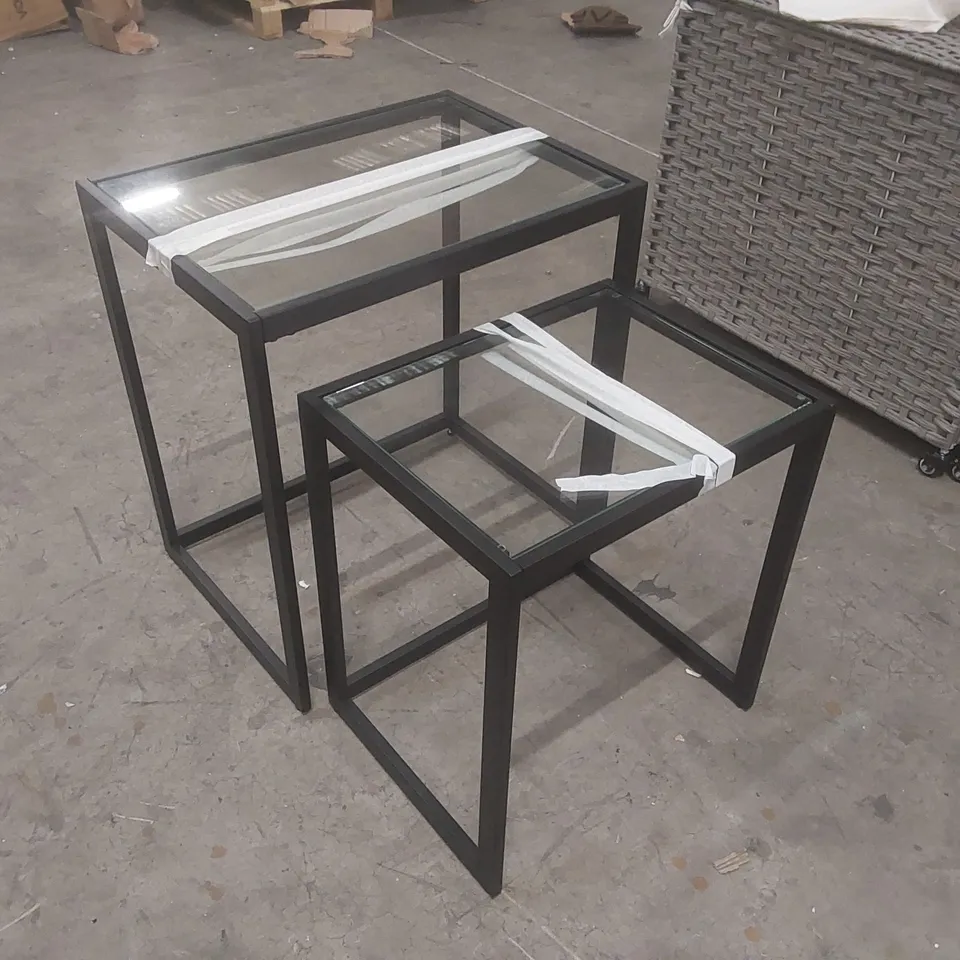 PAIR OF GLASS TOP NESTING TABLES