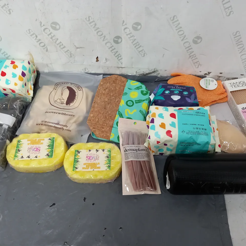 BOX OF APPROXIMATELY 12 ASSORTED COSMETIC ITEMS TO INCLUDE- DISPOSABLE WASHCLOTH - COVERED N CURLY - INFUSED SOAP SPUNGE ETC. 