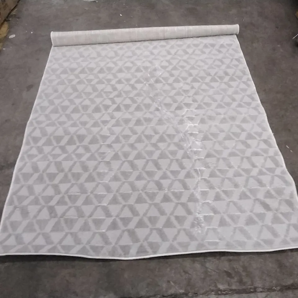 STILLAGE OF APPROXIMATELY 20 DESIGNER RUGS