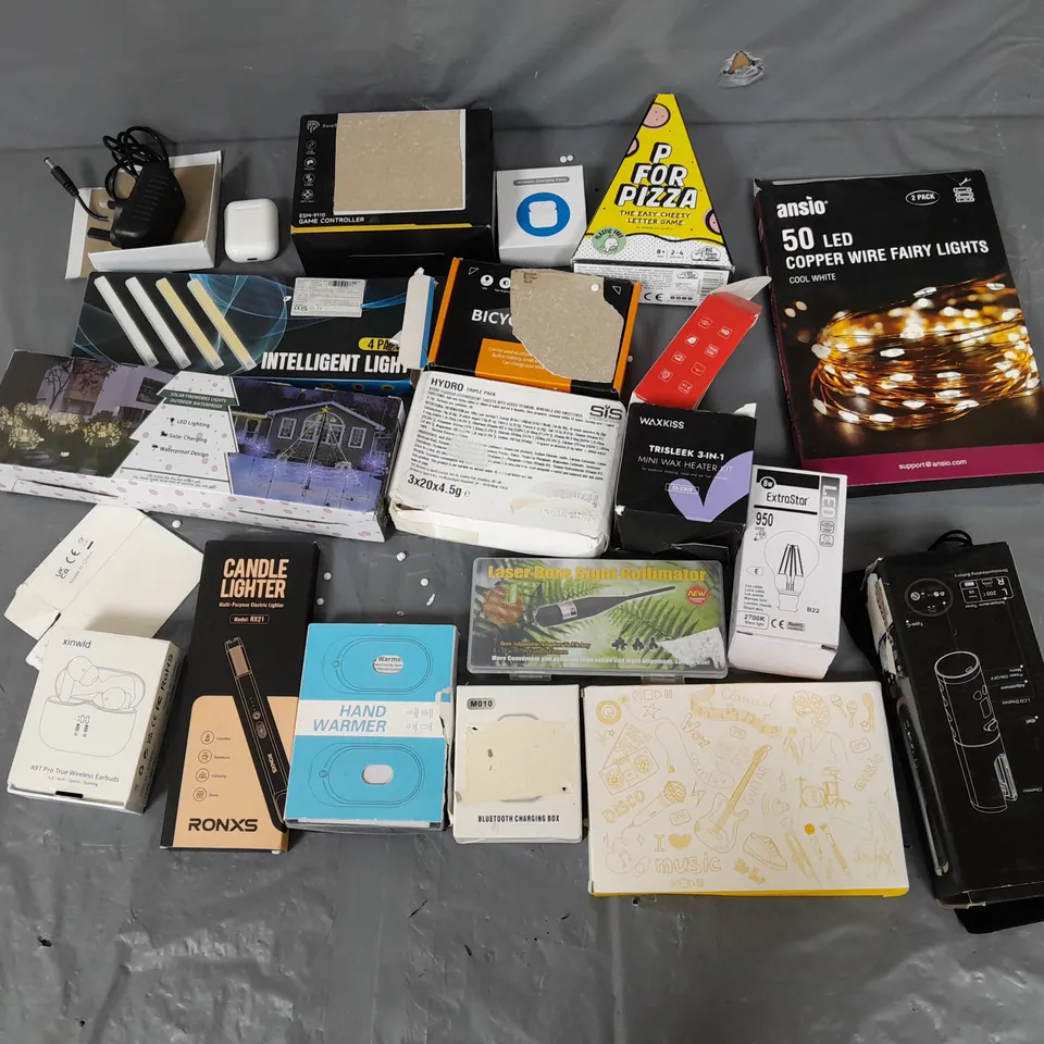 APPROXIMATELY 12 ASSORTED HOUSEHOLD GOODS TO INCLUDE LIGHTBULB, CANDLE LIGHTER, WIRELESS EARBUDS, AND CHEESY LETTER GAME ETC. 