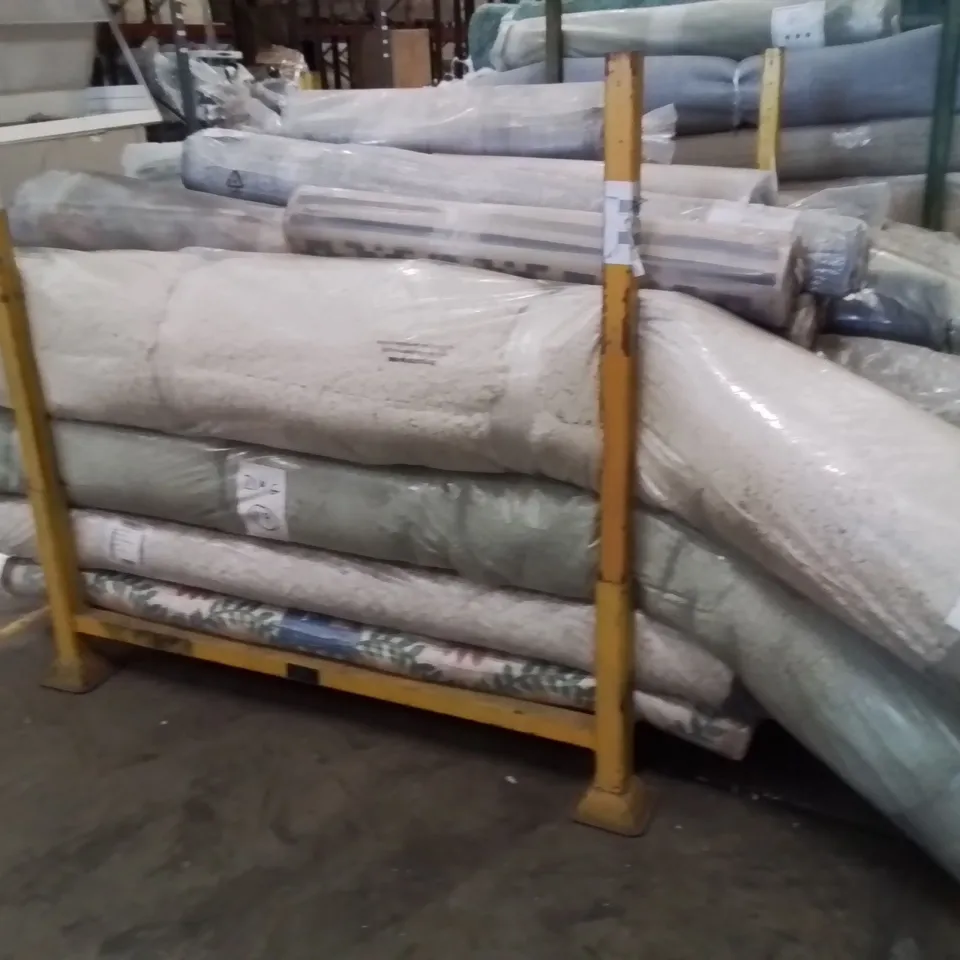 STILLAGE OF APPROXIMATELY 20 BAGGED QUALITY DESIGNER RUGS