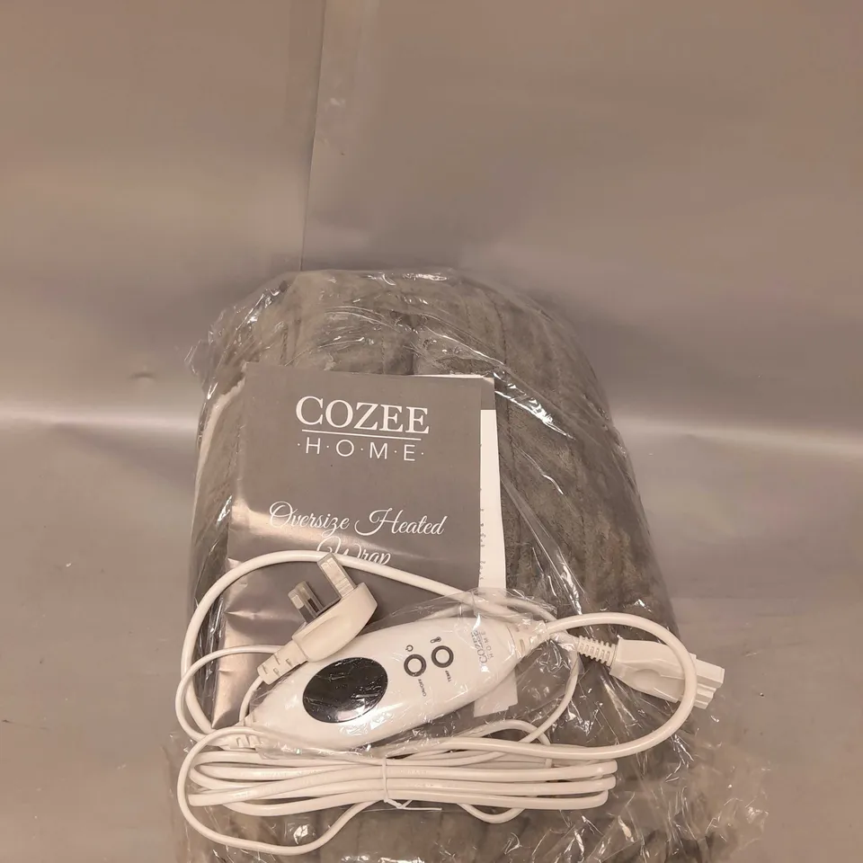 BOXED COZEE HOME OVERSIZED HEATED WRAP IN SILVER/GREY