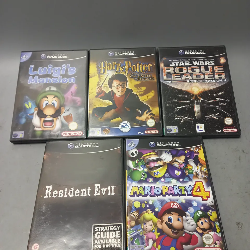 LOT OF 5 NINTENDO GAMECUBE GAMES TO INCLUDE LUIGIS MANSION, MARIO PARTY 4 AND STAR WARS ROGUE LEADER ETC