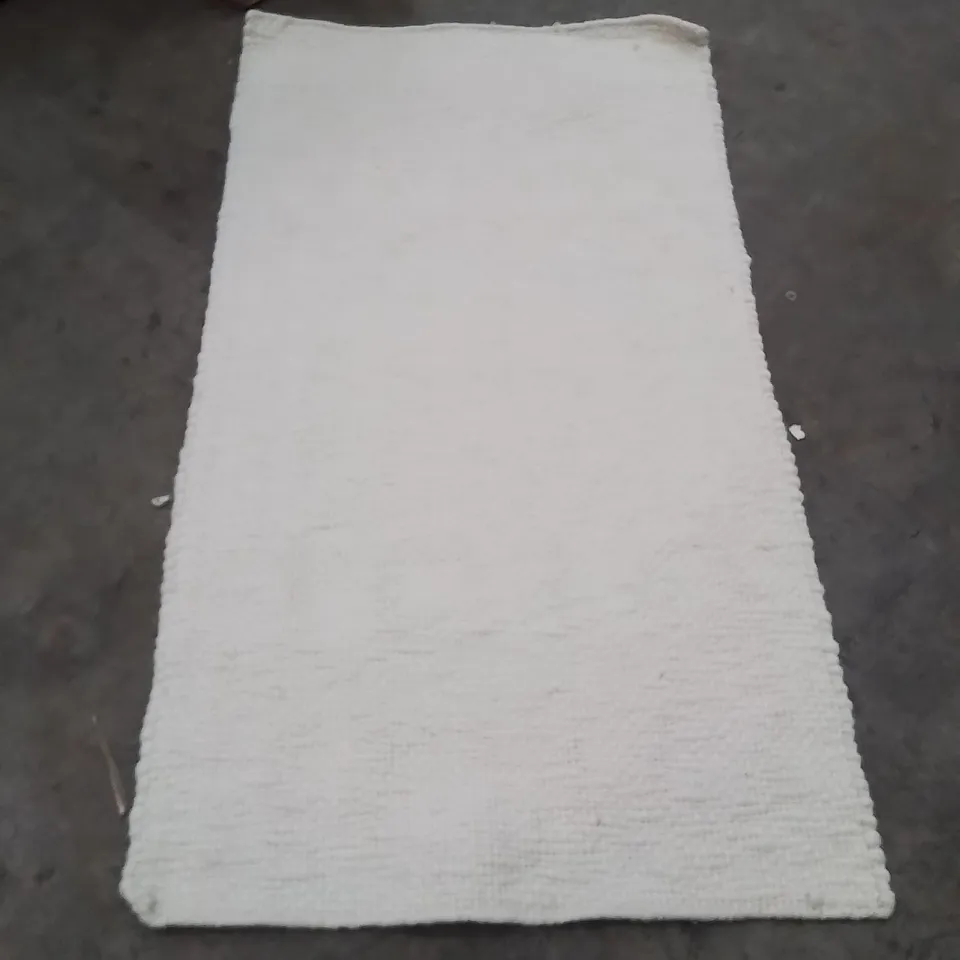 STILLAGE OF APPROXIMATELY 20 QUALITY DESIGNER RUGS