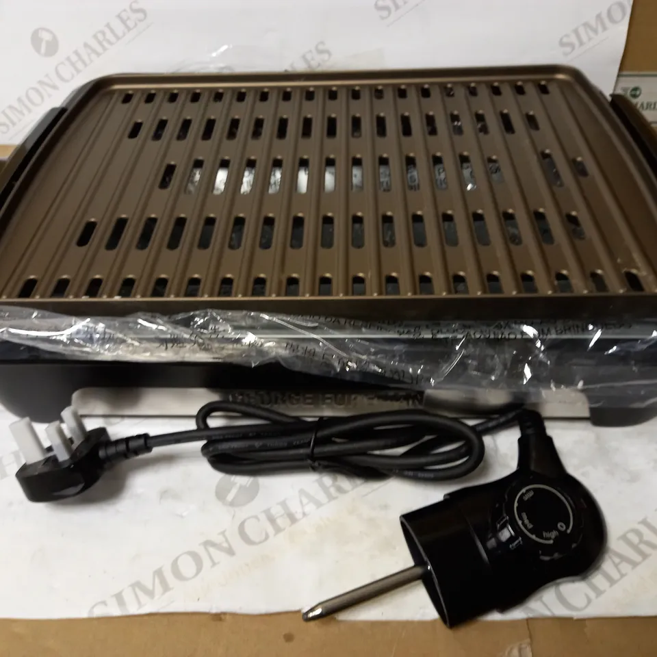 GEORGE FOREMAN SMOKELESS ELECTRIC GRILL