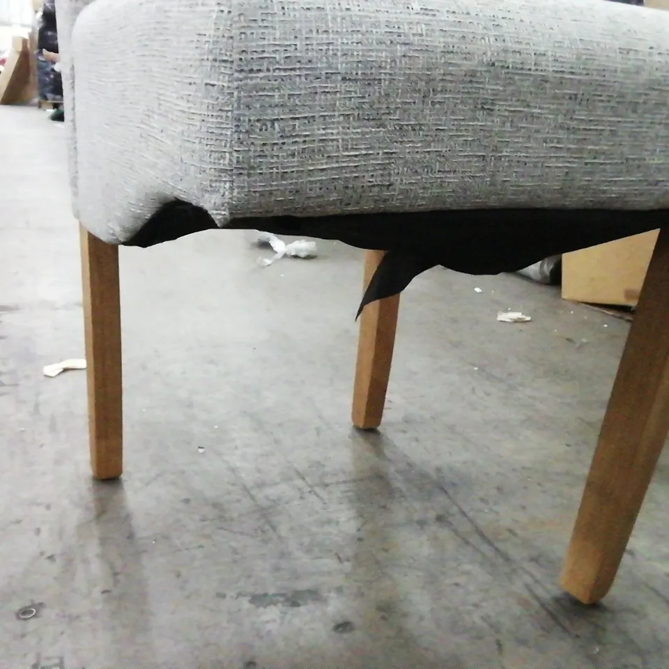 GREY UPHOLSTERED DINING CHAIR - 1 LEG MISSING 