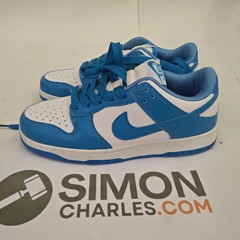 PAIR OF NIKE TRAINERS IN WHITE.BLUE - UK 5.5
