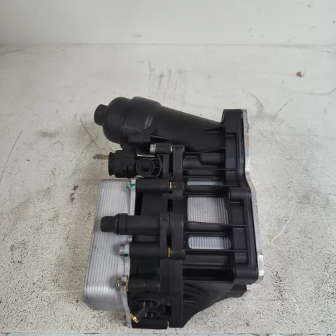 ENGINE OIL FILTER HOUSING AND OIL COOLER ASSEMBLY