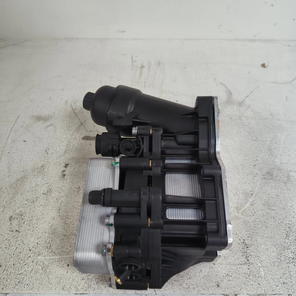 ENGINE OIL FILTER HOUSING AND OIL COOLER ASSEMBLY