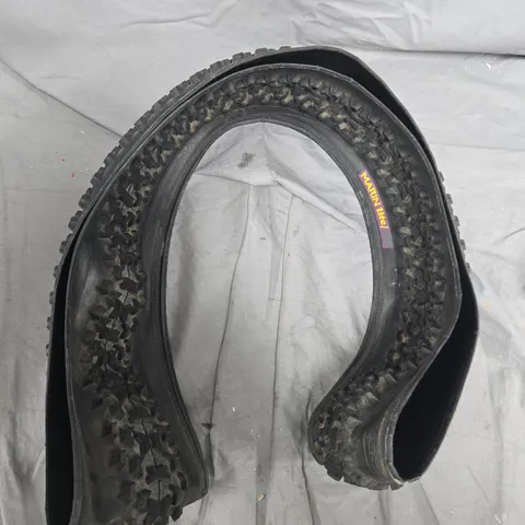 Off-road tyre with chunky lug tread – vehicle part