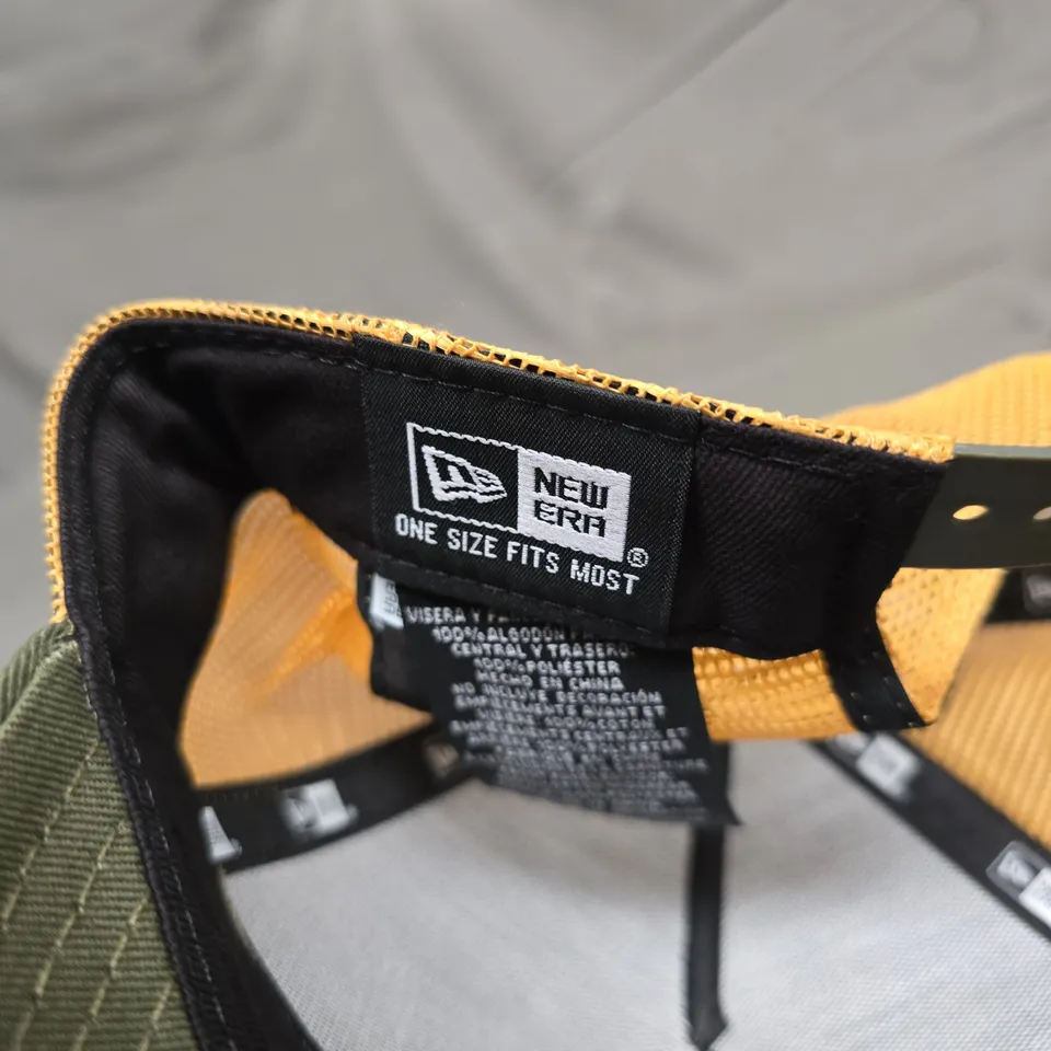 NEW ERA CAP COMPANY TRUCKER HAT – OLIVE GREEN FRONT, MUSTARD MESH – OSFM