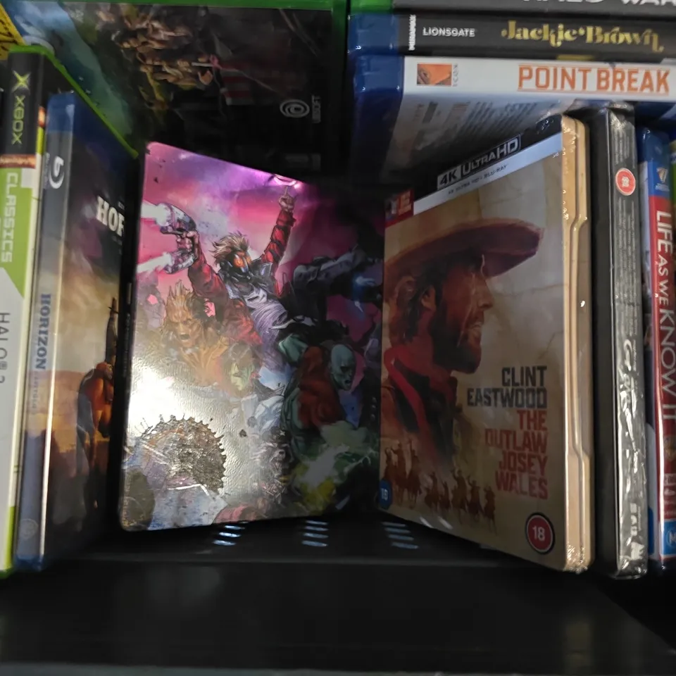 TOTE OF APPROXIMATELY 15 ASSORTED VIDEO GAMES & DVDS TO INCLUDE - XBOX ONE DEAPOOL , XBOX ONE W2K15 , AIRPLANE BLU RAY ETC