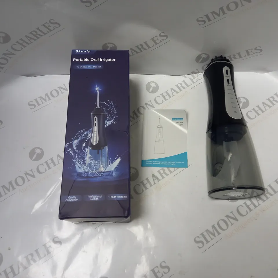 BOXED SKEUFY PORTABLE ORAL IRRIGATOR WITH USB CABLE AND INSTRUCTIONS