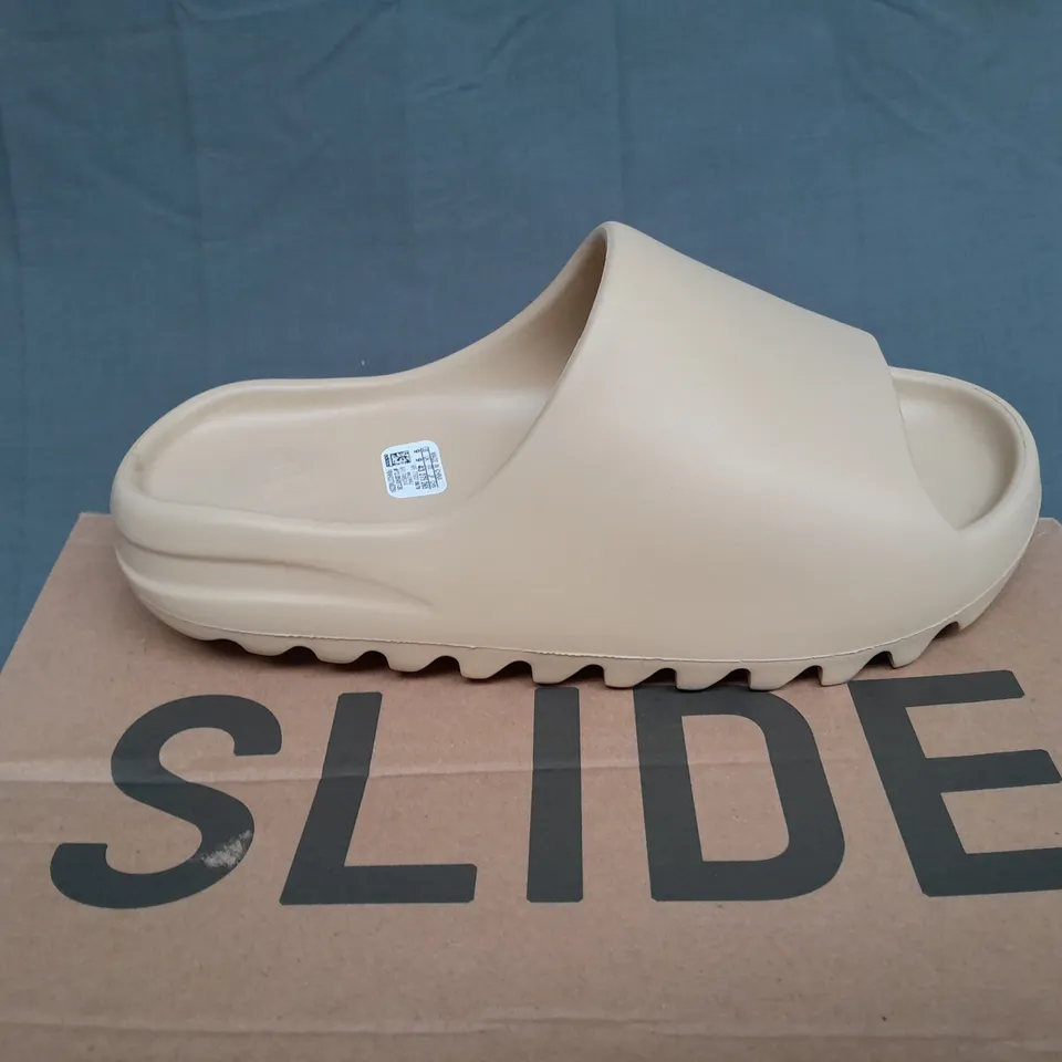 BOXED PAIR OF YEEZY SLIDE BY ADIDAS UK 9 
