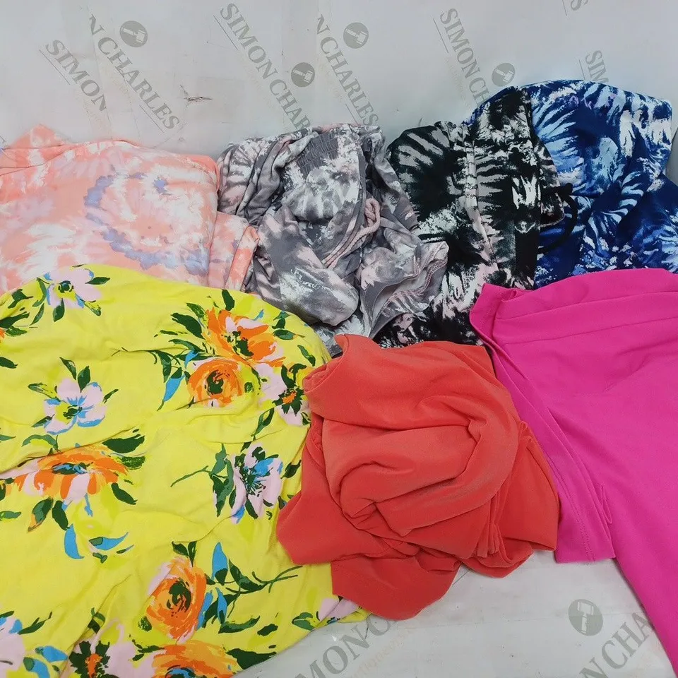 LARGE BOX OF ASSORTED CLOTHING ITEMS TOO INCLUDE TOPS , TROUSERS AND JUMPERS COMING IN DIFFERENT COLOURS AND SIZES 