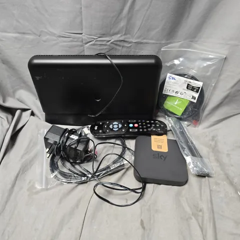 APPROXIMATELY 12 ASSORTED HOUSEHOLD ITEMS TO INCLUDE ROUTERS, TV REMOTES, POWER CABLE, ETC