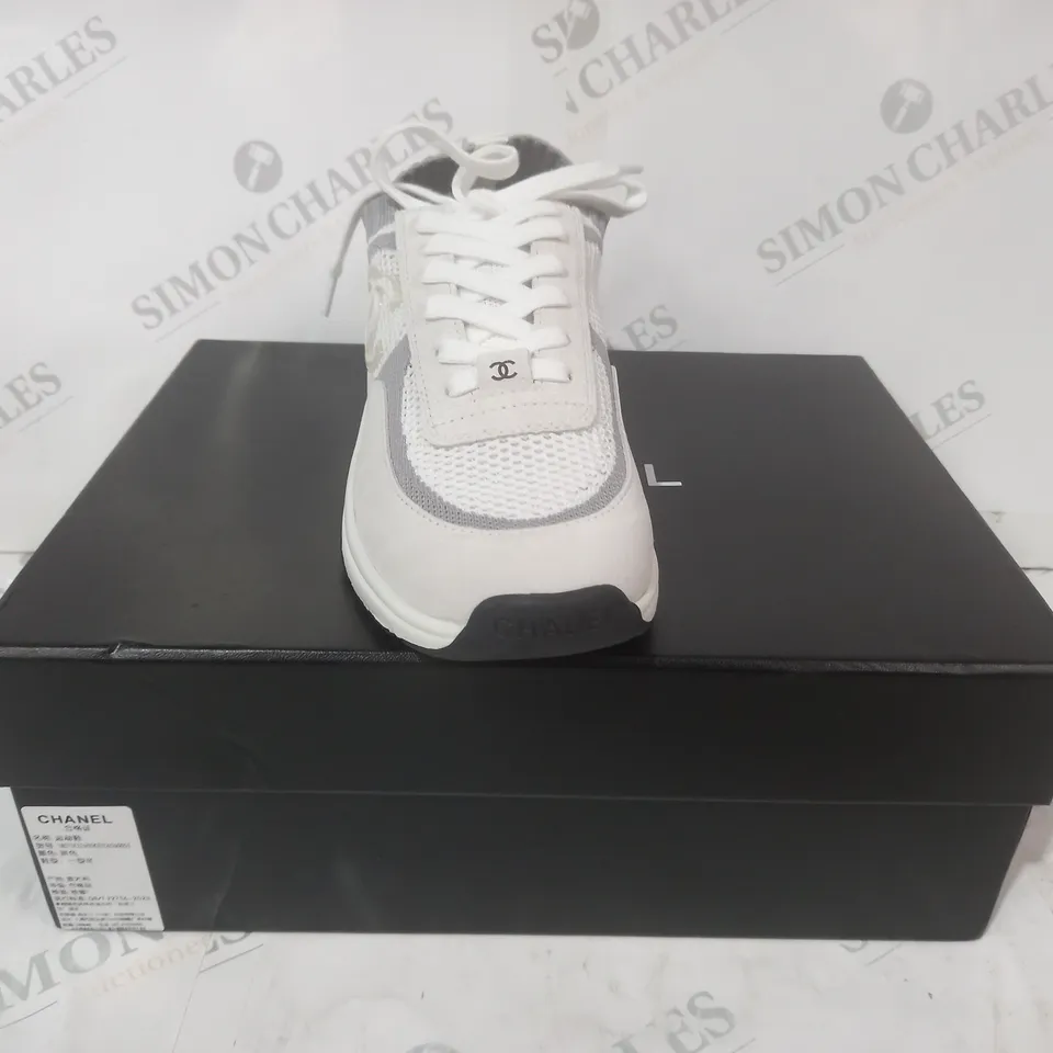 BOXED PAIR OF CHANEL SNEAKERS IN GREY/WHITE EU SIZE 38