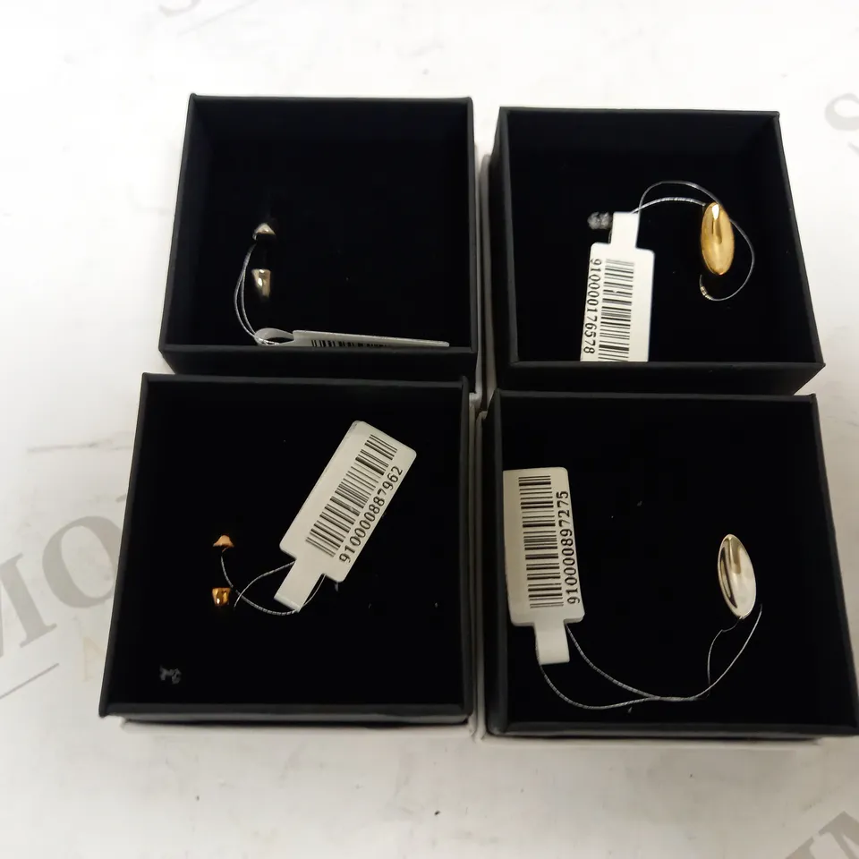LOT OF 4 GIORE RINGS