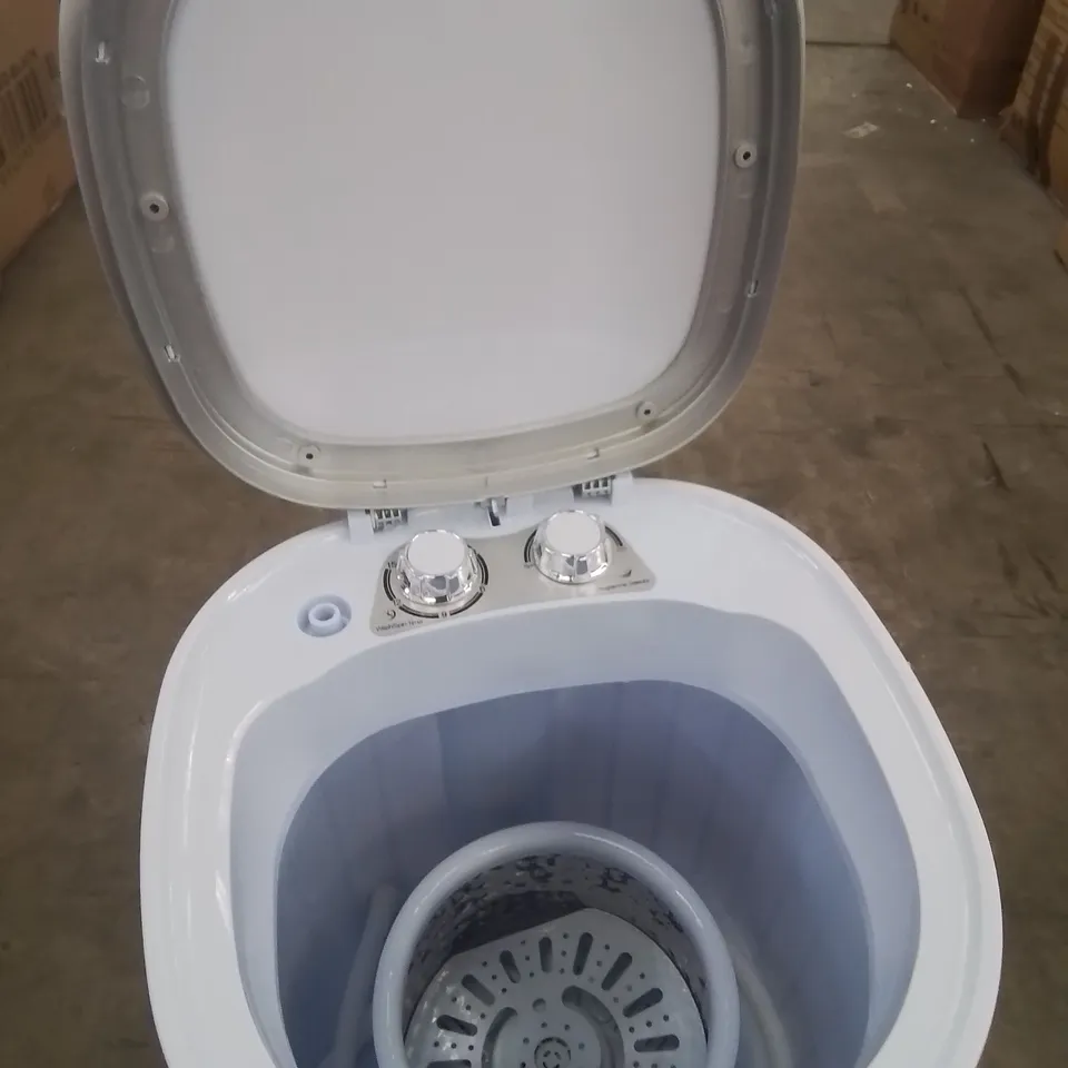 A BOXED PORTABLE MINI WASHING MACHINE AND SPIN DRYER SYSTEM 