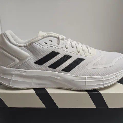 BOXED PAIR OF ADIDAS DURAMO 10 SNEAKERS – WHITE, UK 11