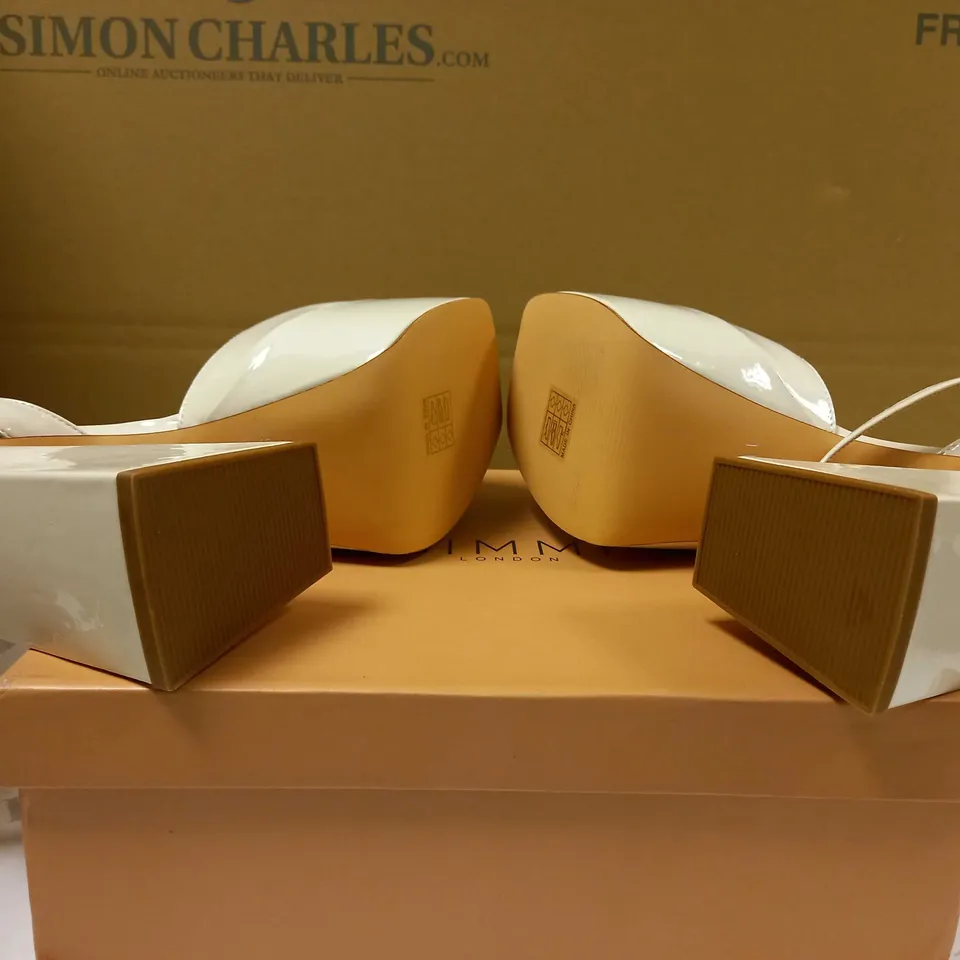 BOXED PAIR OF SIMMI CREAM PLATFORM HEELS - SIZE 4
