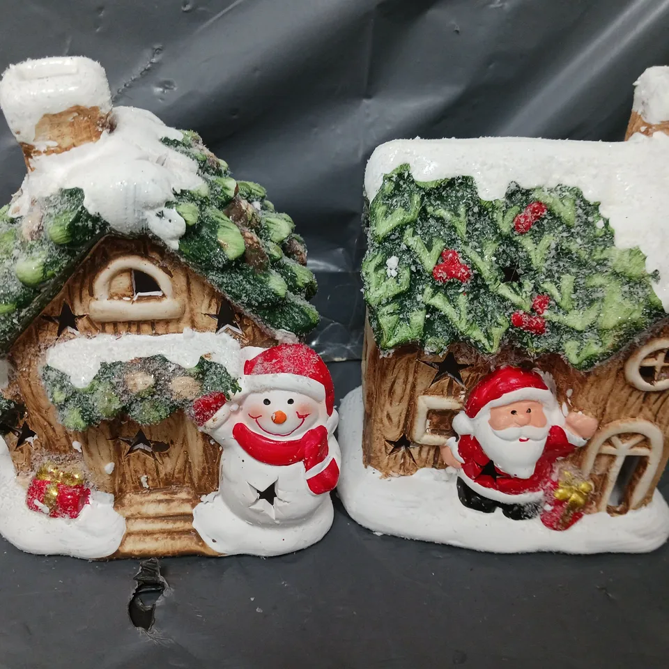 FESTIVE SET OF 2 LIT CERAMIC SANTA/SNOWMAN HOUSE CHRISTMAS DECORATIONS 