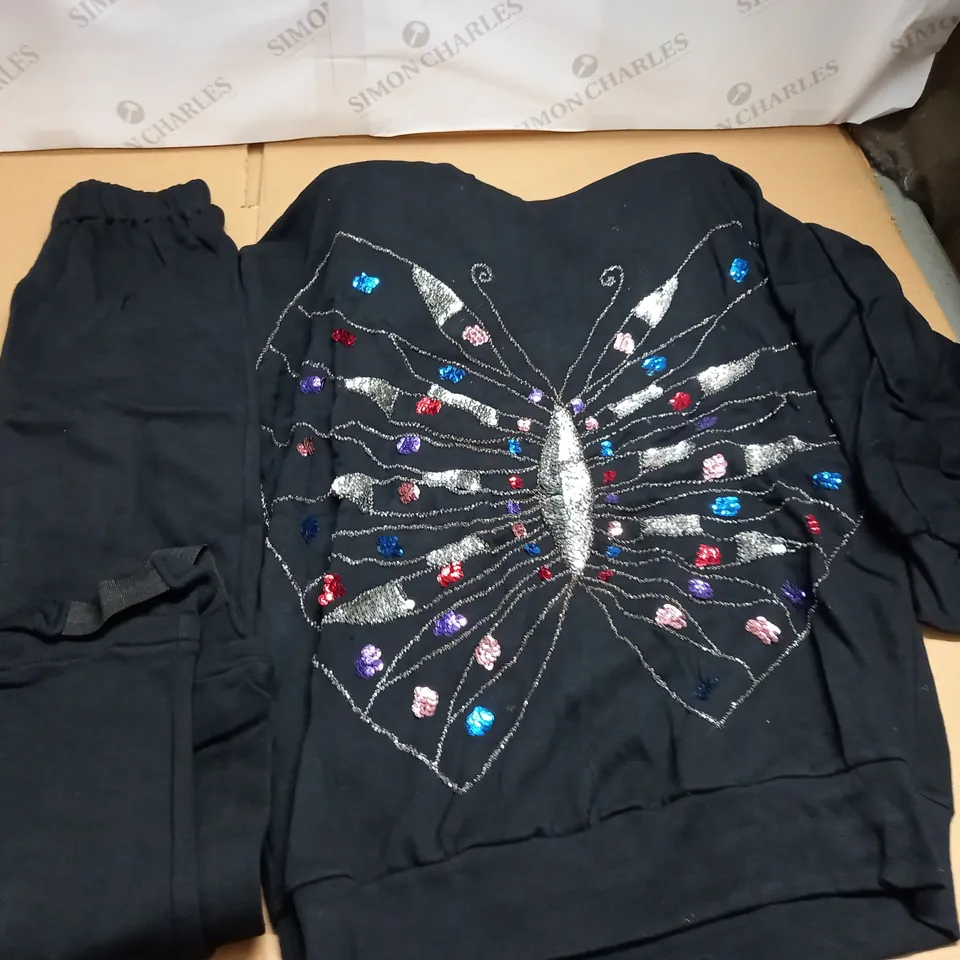 LOT OF APPROXIMATELY 12 EMBELLISHED JUMPERS WITH TROUSERS AND PADDED SHOULDERS - SIZE UNSPECIFIED