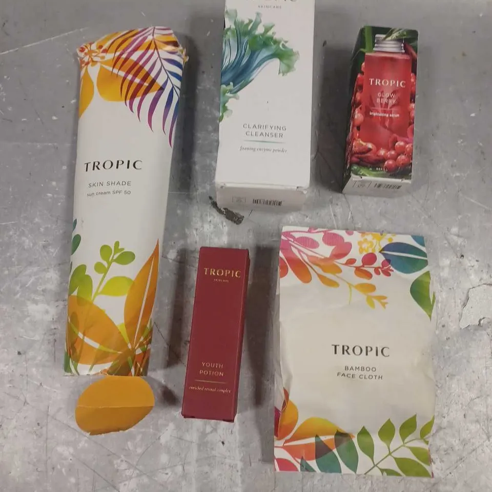 TROPIC SKINCARE LOT OF 5 ASSORTED COSMETIC PRODUCTS TO INCLUDE - SKIN SHADE SPF 50 SUN CREAM - GLOW BERRY BRIGHTENING SERUM - YOUTH POTION ENRICHED RETINOL COMPLEX ETC