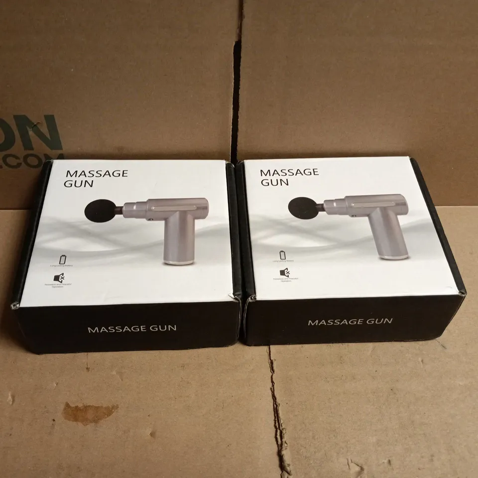 2 X MASSAGE GUN BOXED