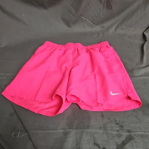 NIKE SHORTS IN NEON PINK SIZE L