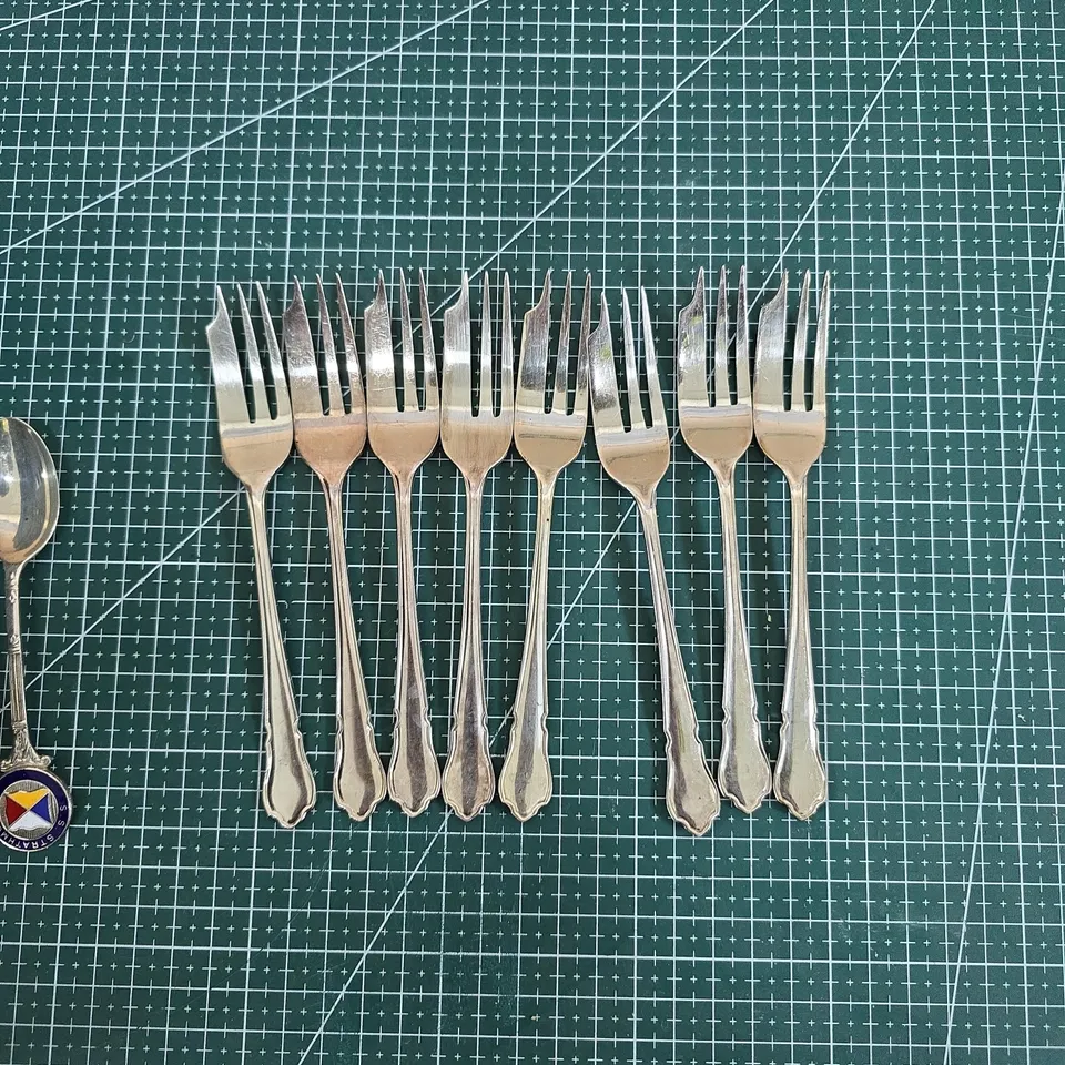 TWO DECORATIVE SPOONS AND SET OF 8 HARRISON FISHER PASTRY FORKS 