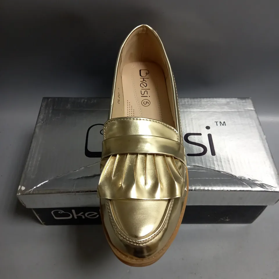BOXED KELSI LADIES FLAT GOLD BROGUES. SIZE 5