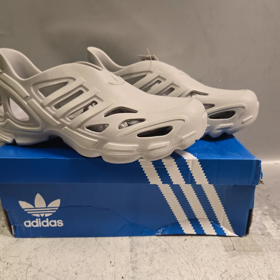 BOXED PAIR OF ADIDAS ADIFOM SUPERNOVA SHOES IN GREY SIZE UK 10